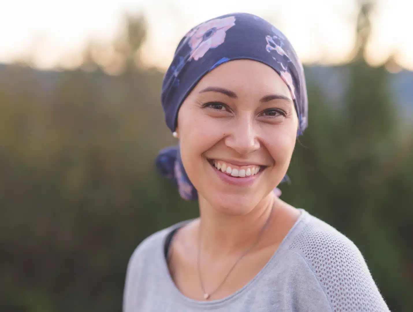 research program cancer detection therapy woman bandana