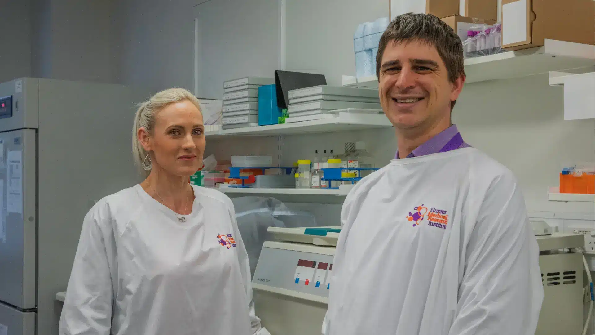 Immune health researchers Dr Bronwyn Berthon and Dr Kurtis Budden standing in a lab