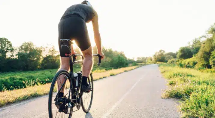 Man riding a bike outside