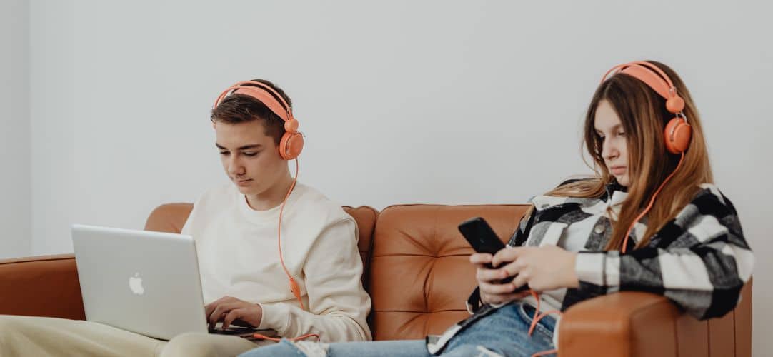 teenagers using technology devices