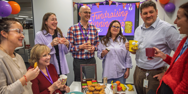 People having a fundraising morning tea for medical research